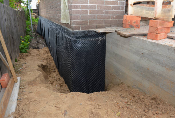 Happy homeowners after waterproofing job in Kings Mills